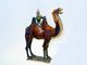 China: A Sogdian Silk Road trader on a Bactrian camel, Tang Dynasty (618 - 907) sancai ceramic, Shanghai Museum, Shanghai